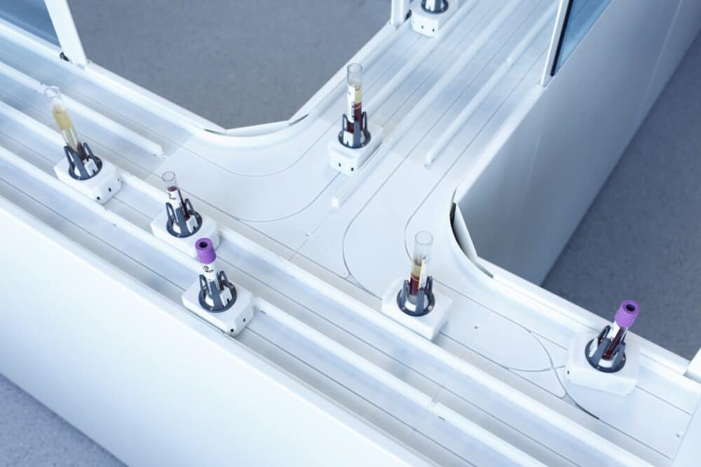 Highly flexible automatic sample distribution system: it transports each sample (specimen) individually, as this is the only way to achieve flexible, custom, and optimum organization of individual samples. (Credit: FAULHABER)